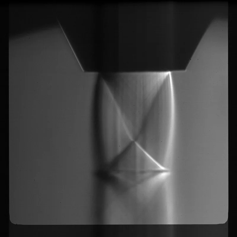 Near-field shock structure at the nozzle exit